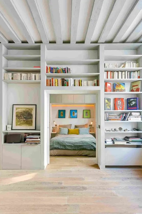 A door with open shelves to store books and artwork is a very cool idea