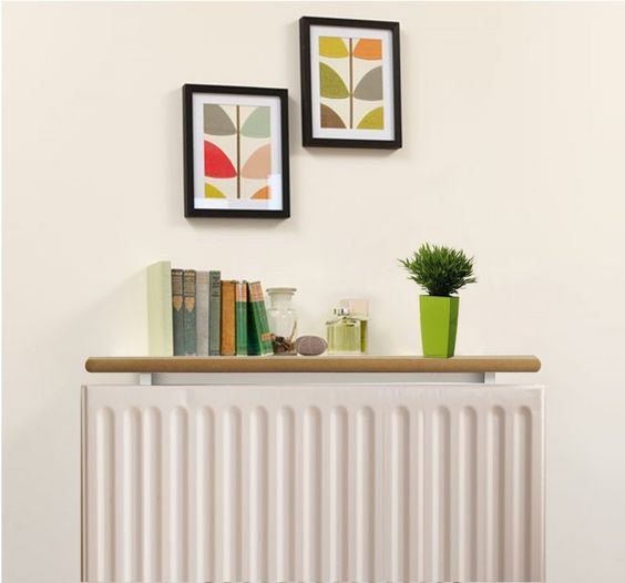 A narrow and thin radiator shelf for display and storage is always a good idea for any room. It's a cool idea that you can easily implement yourself