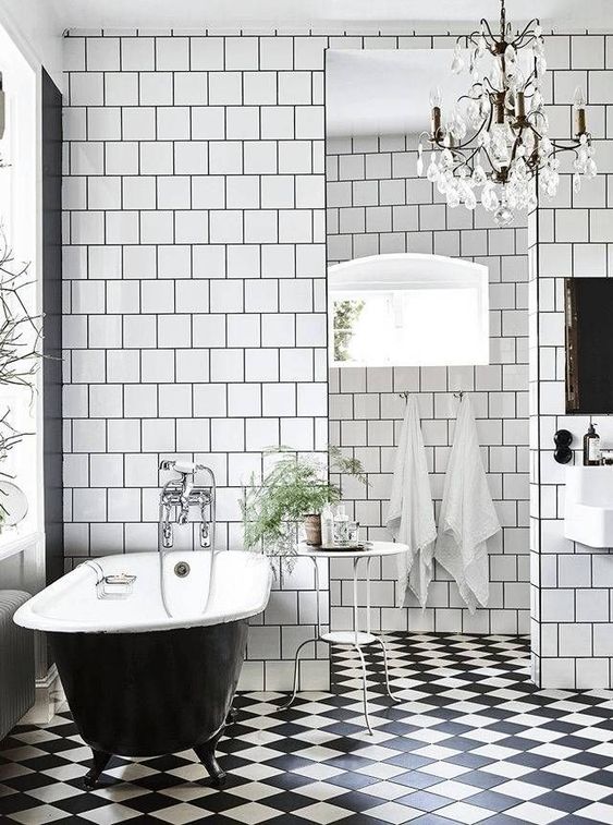 A checkered black and white floor is ideal for adding a vintage touch to the bathroom