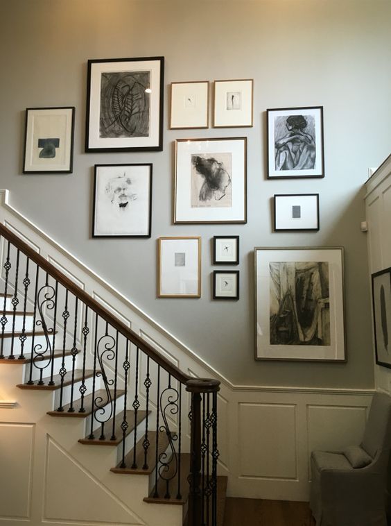 A sophisticated freeform gallery wall with lots of graphic art and mismatched frames is a cool idea for a vintage or just plain sophisticated space