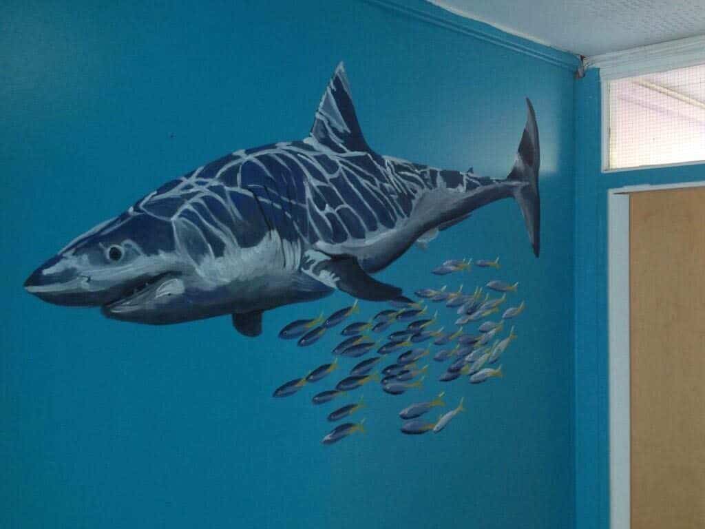 Wall Mural Shark swims with fish 