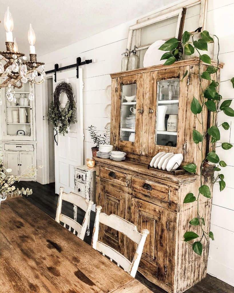 Rustic living room with vintage decor and barn door 