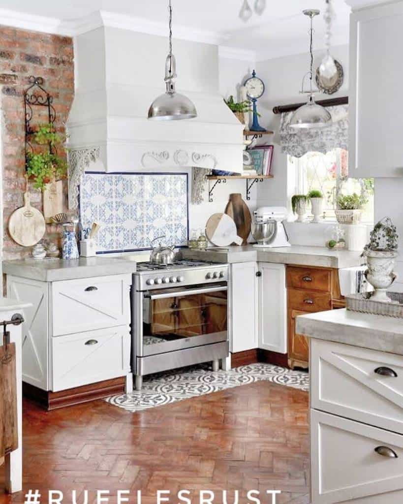 cluttered country kitchen, blue and white tile backsplash, pendant lights, brick wall 