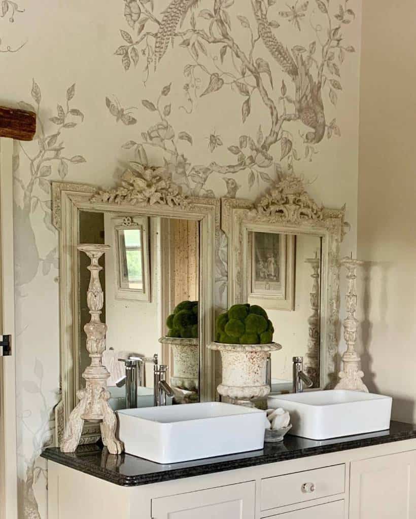 elegant bathroom bird wallpaper with two vanity candlesticks 