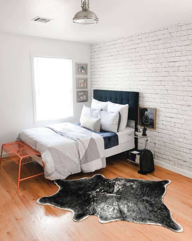 Fake carpet made of animal fur in the bedroom with white brick walls