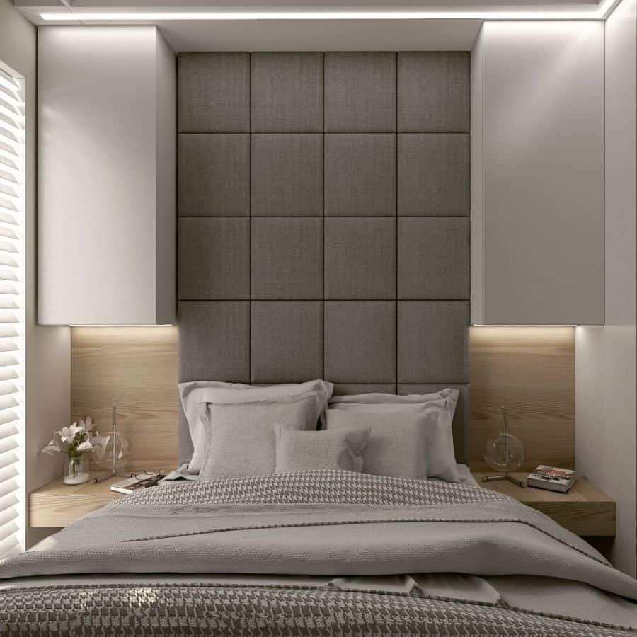 Modern small bedroom with gray pillow headboard 