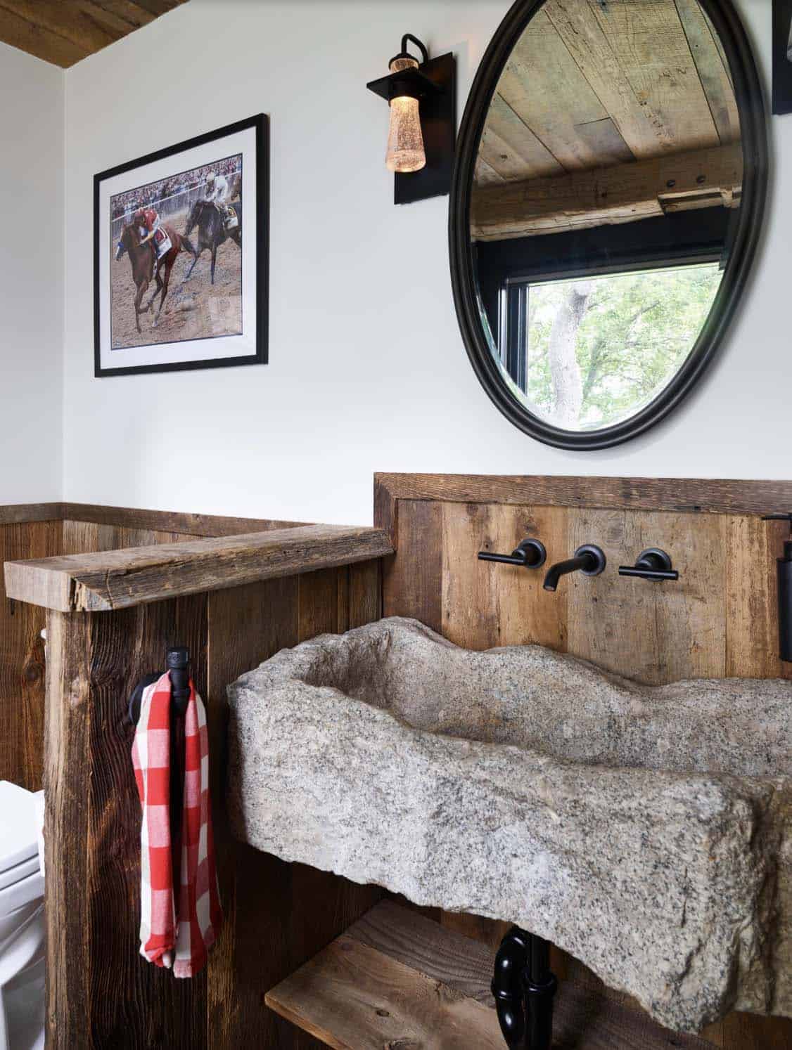 Rustic bathroom with large stone sink