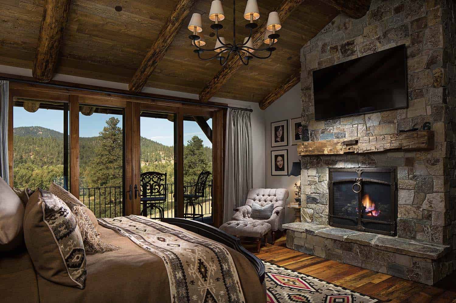 Rustic cabin style bedroom with fireplace