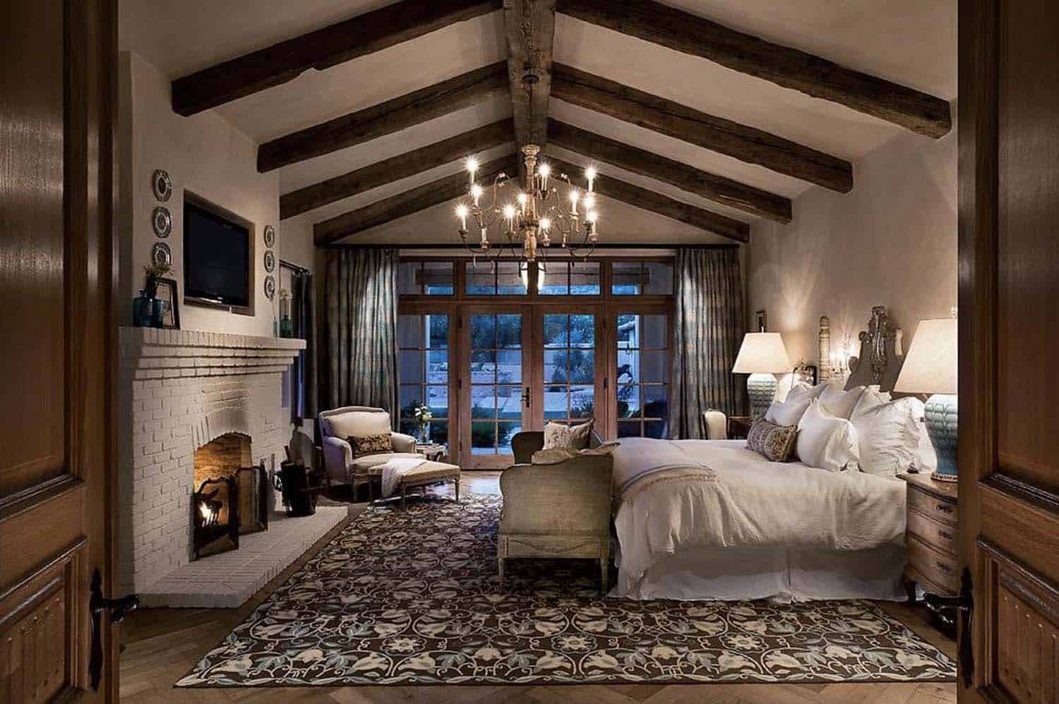 Southwestern style bedroom with fireplace