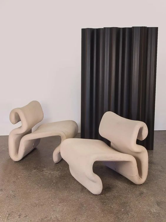 Very eye-catching beige curved chairs that make a statement with their shapes and make your room more eye-catching and cool