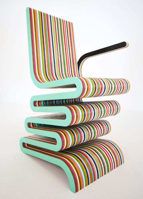 A colorful chair made of bent plywood reminiscent of a candy is a super creative piece that will transform your interior