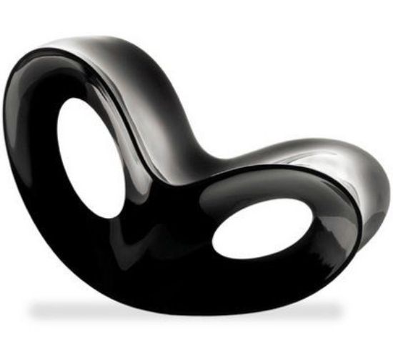 An eye-catching black curved chair with hollows is an alternative to an ordinary rocking chair, a very fresh and modern alternative to an ordinary rocking chair