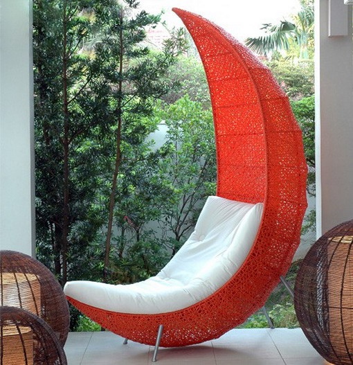 A strong red woven chair with an extended back and a white seat placed inside is a nice idea not only for indoors but also for outdoors