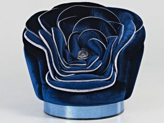 A rose-shaped navy blue velvet chair with silver edges is a cool and bold idea for a sophisticated and atmospheric space, adding a romantic touch