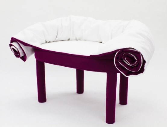 A purple and white chair with a built-in blanket that allows you to partially or fully cover yourself for more comfort