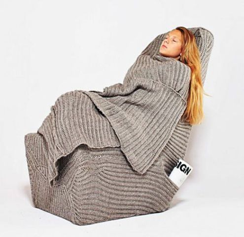 A unique greige blanket chair is a cool idea for any room, it adds a lot of coziness and you can cuddle in it as much as you want
