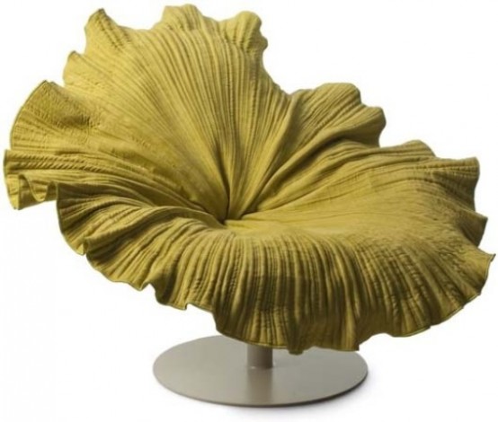 A bright yellow chair reminiscent of a blooming flower is a unique idea that can be applied to many interiors, especially romantic ones