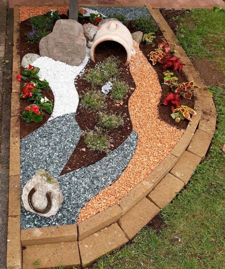 Create a small flower garden using pebbles