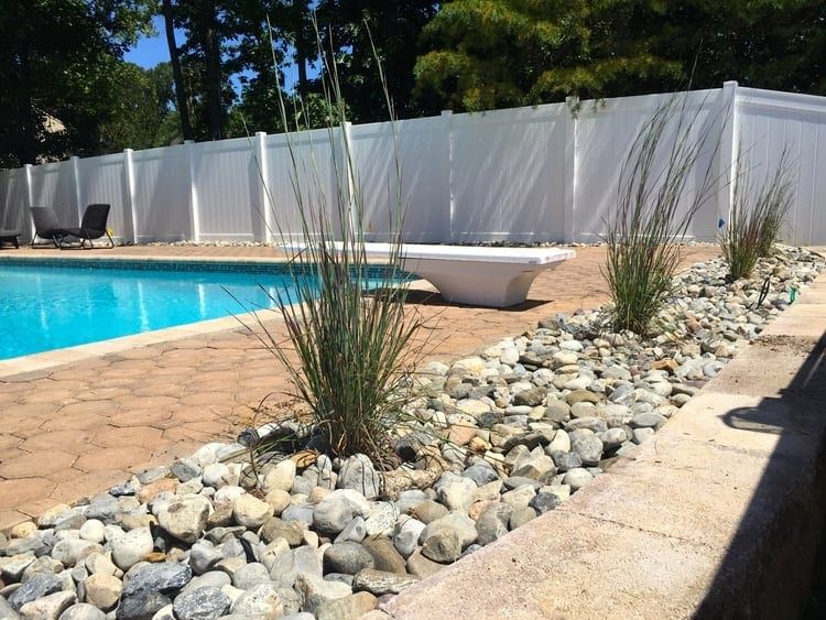 Creating a Stunning Backyard Oasis with Pool Landscaping