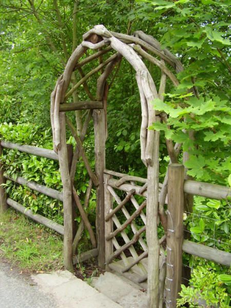 A Charming Addition: The Beauty of a Rustic Garden Fence