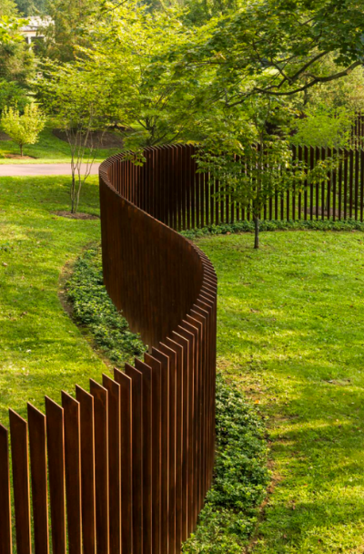 Creative Ways to Elevate Your Backyard with Unique Fence Designs