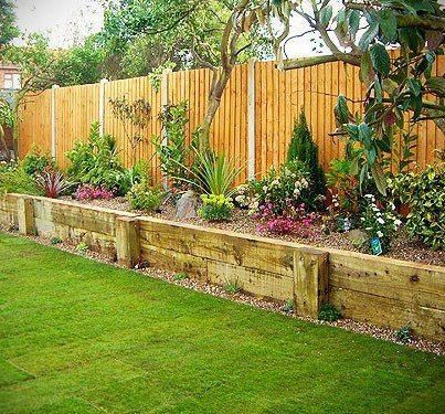 Enhancing Your Garden with Raised Beds Along the Fence