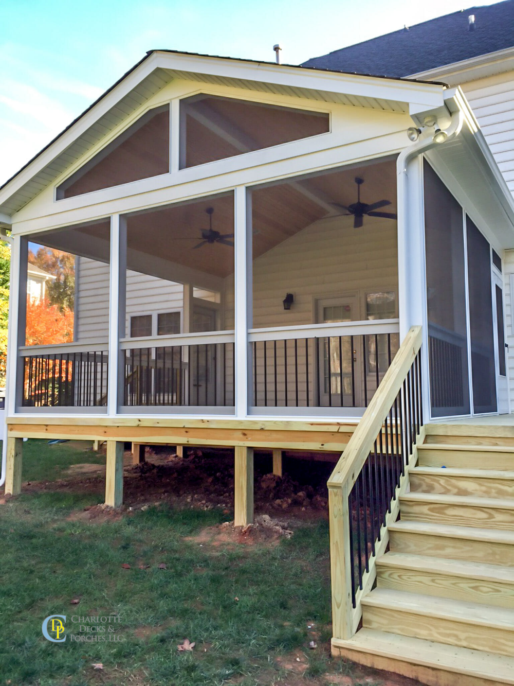 Enhancing Your Outdoor Space with a Beautiful Screened-In Porch and Deck