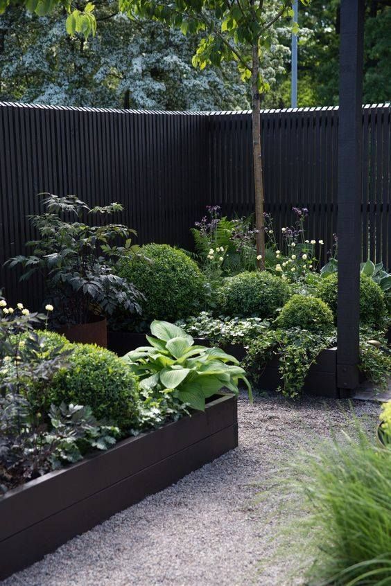 Maximizing Space with Raised Garden Beds Along the Fence