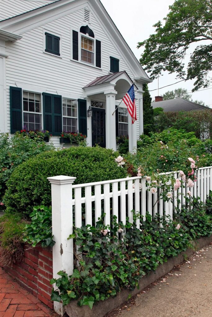 white picket fence front yard