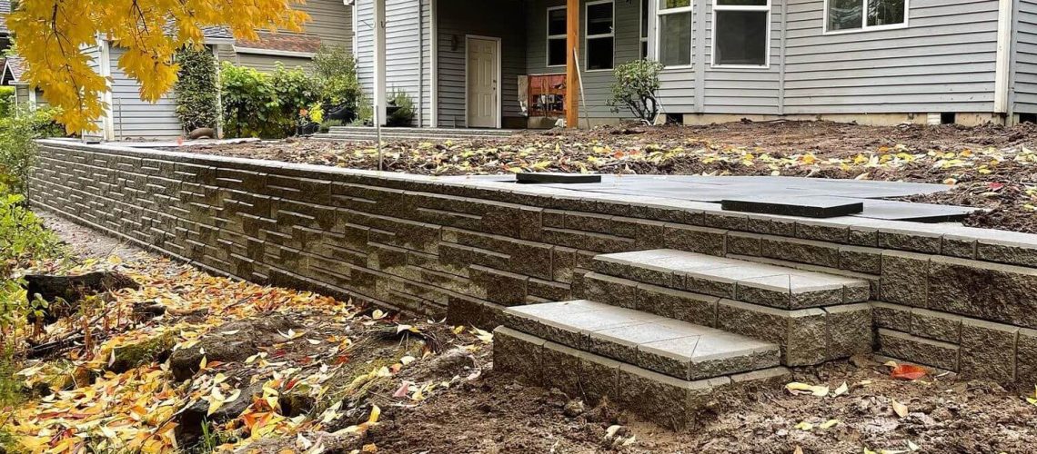 5 Reasons Your Yard Needs a Retaining Wall as part of the Landsca