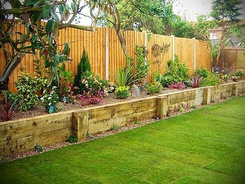 Raised Flower Bed Along Fence Gard