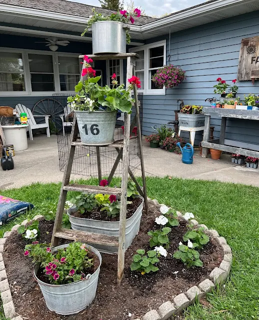 Adding Vertical Interest To A Small Flower Bed - Organized Clutt